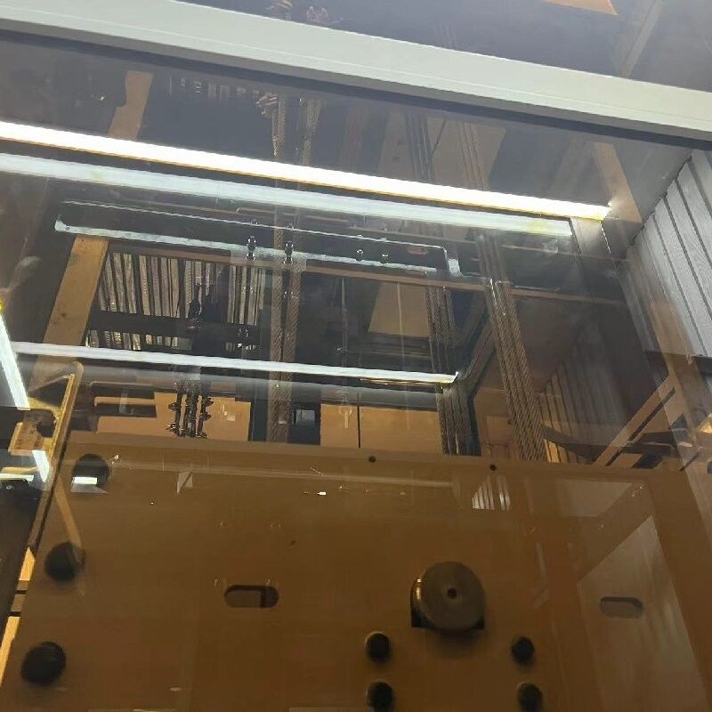 Tiếng ồn giảm nhẹ thang máy kéo không có bánh xe thang máy gia dụng với cửa trượt tự động lên đến 1000 kg